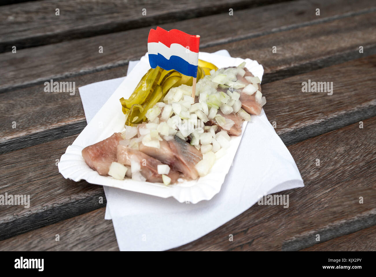 traditional Dutch snack with raw herring with pickles Stock Photo