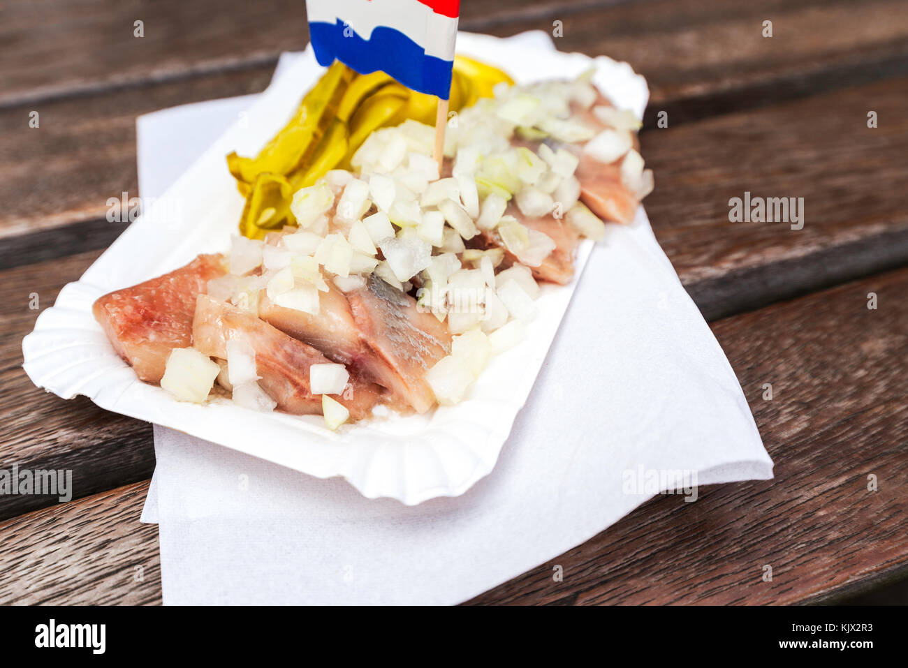 traditional Dutch snack with raw herring with pickles Stock Photo Alamy