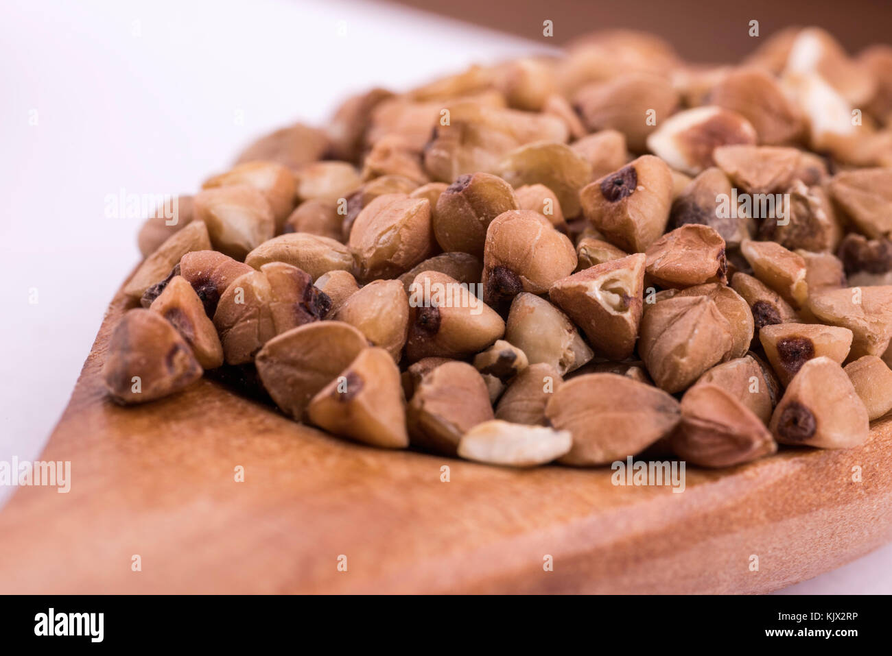 macro photo of spoon with sulfur buckwheat Stock Photo Alamy