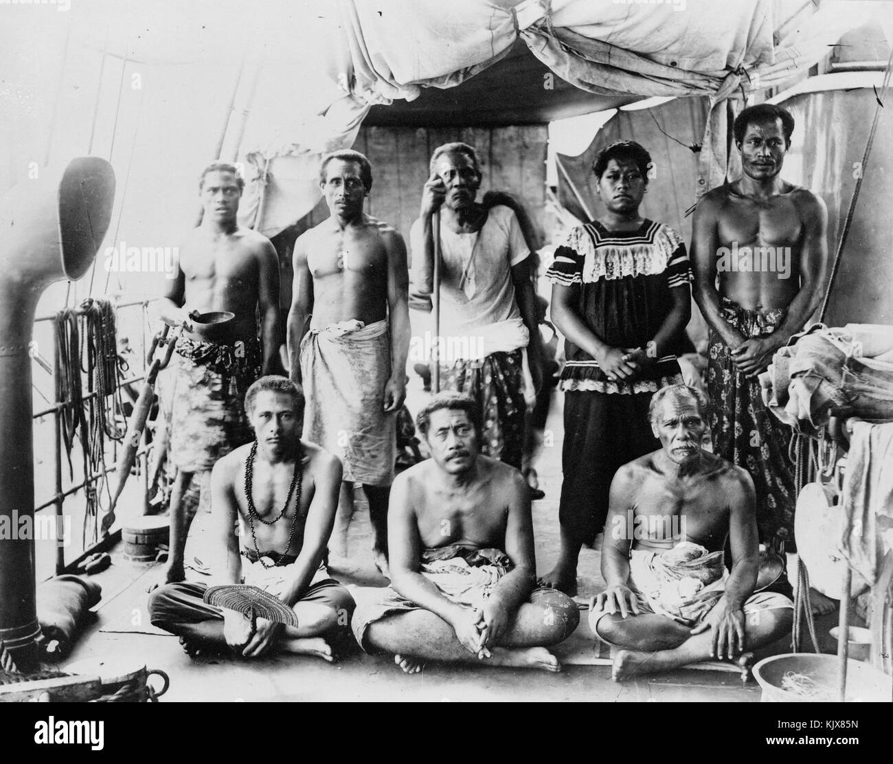 Lauaki Namulau'ulu Mamoe (standing 3rd from left with orator's staff) and other chiefs aboard German warship taking them to exile in Saipan, 2909 Stock Photo