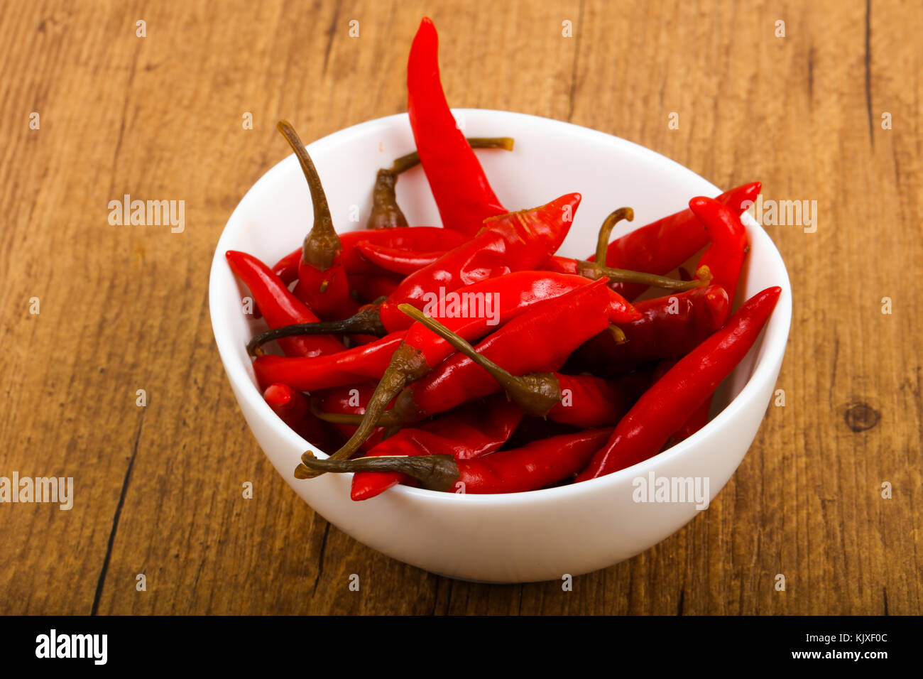 Pickled chili peppers Stock Photo - Alamy