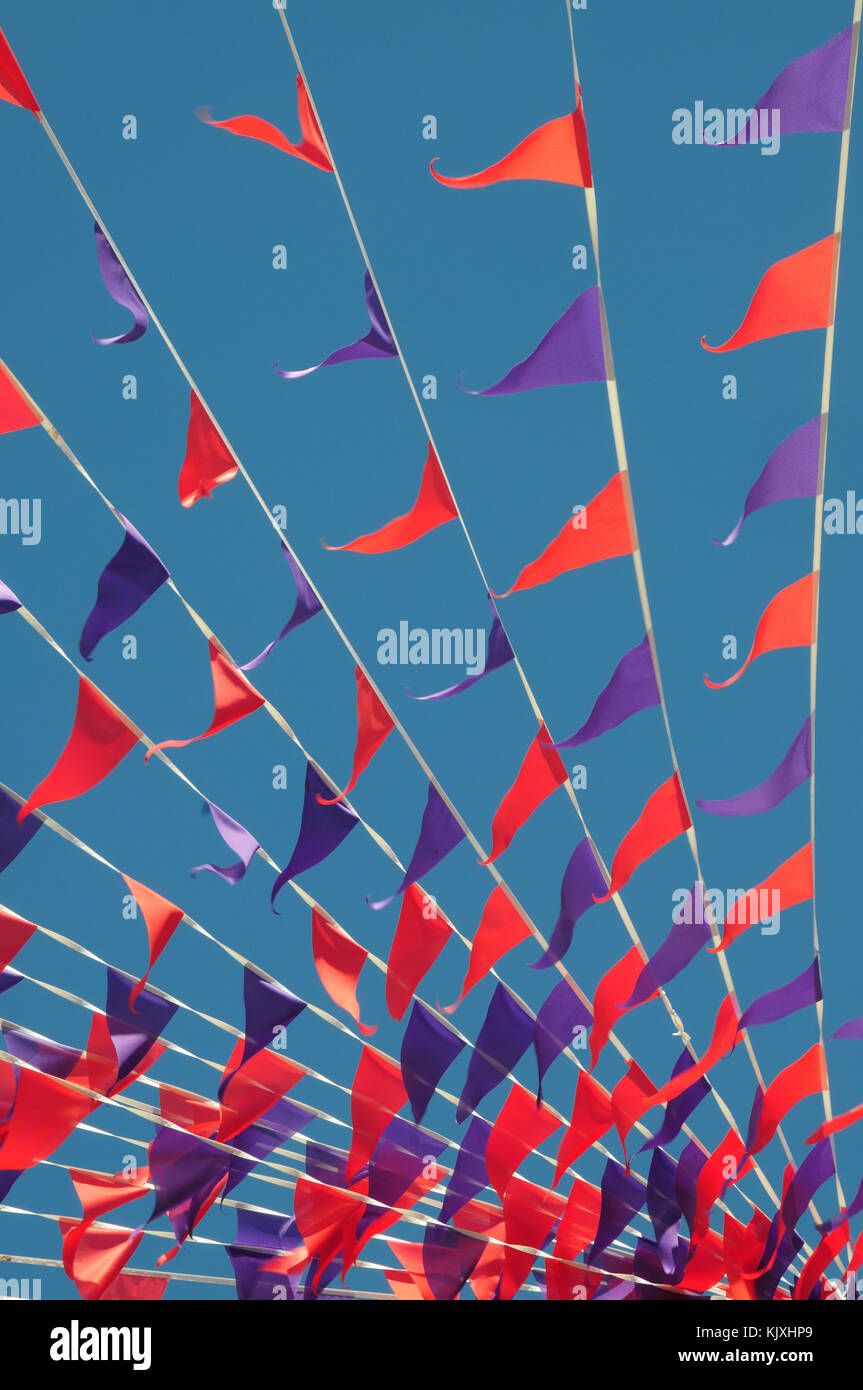 Summer bunting flags against a blue sky Stock Photo Alamy