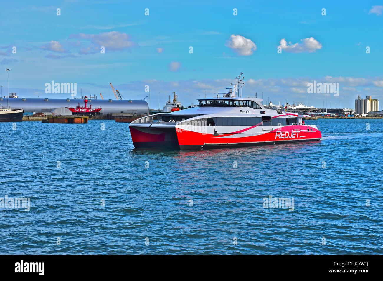 Red Jet 6 high speed catamaran passenger ferry approaches Town Quay in Southampton from West Cowes, Isle of Wight Stock Photo