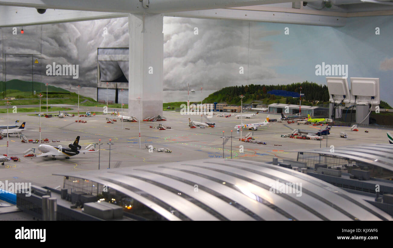 HAMBURG, GERMANY - MARCH 8th, 2014: Flughafen Wunderland. Up to 40 different aircrafts, from Cessna to Airbus A 380, are taxing independently on Knufingen Airport at Miniatur Wunderland Museum to the gates Stock Photo