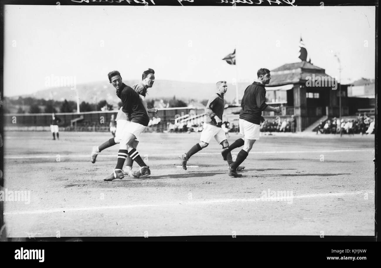This photo captures a football match from 1919 at Frogner Stadion, showcasing the historic nature of the game and the players, with a nostalgic atmosphere of early 20th-century football. Stock Photo