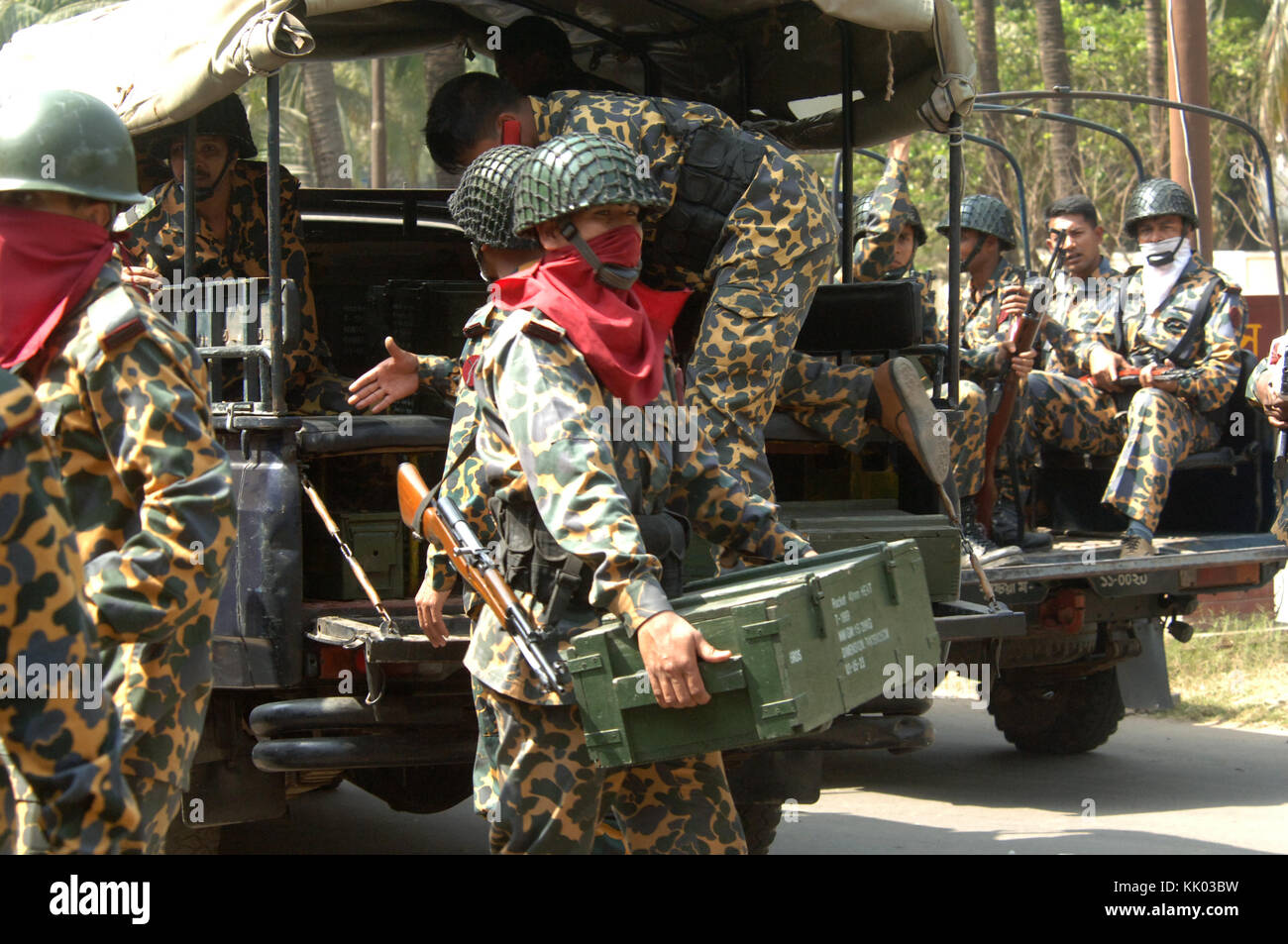 DHAKA, BANGLADESH FEBRUARY 26, 2009 Bangladesh border guards carry