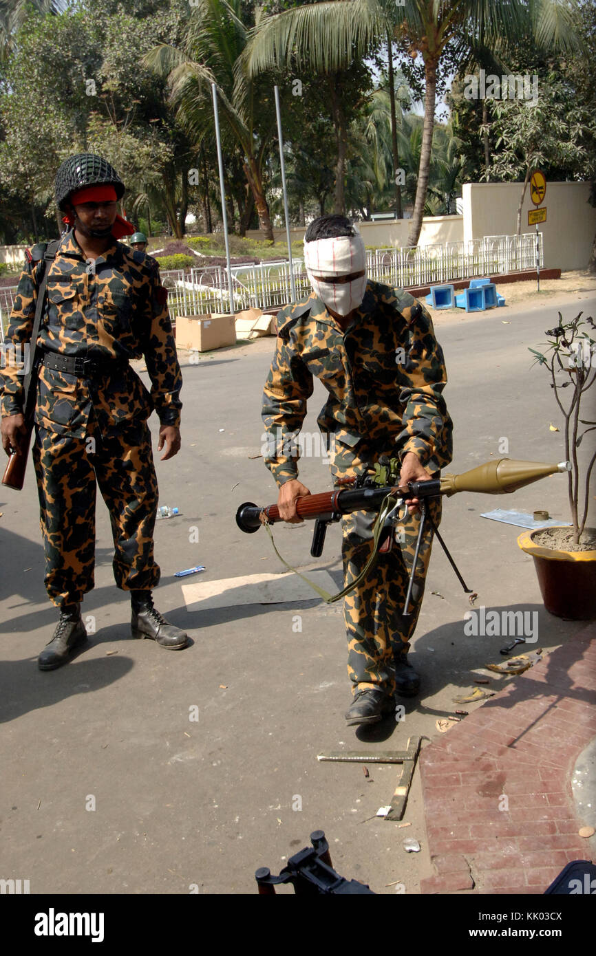 DHAKA, BANGLADESH FEBRUARY 26, 2009 Bangladesh border guards carry
