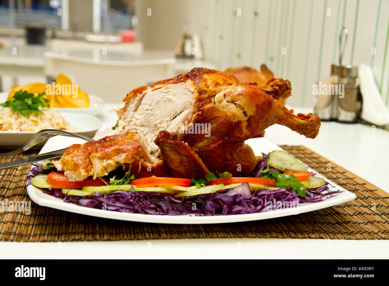 Charcoal baked chicken and side dishes Stock Photo