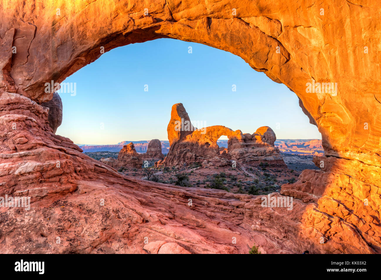 Turret Arch at sunrise within the North Window natural arch in the