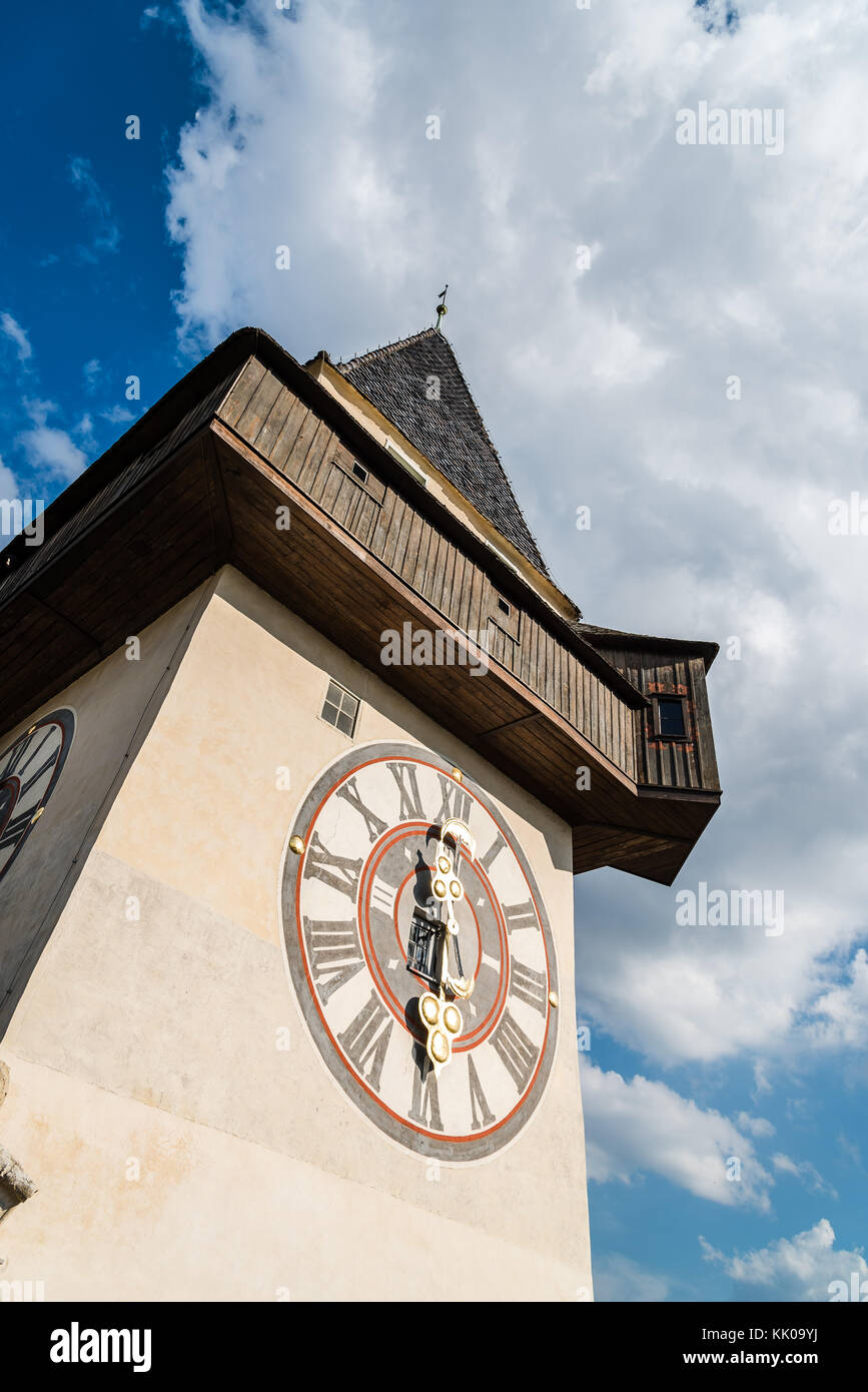 Low angle view of Uhrturm clock in Graz Stock Photo