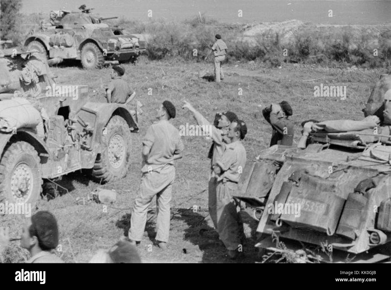 New Zealand Divisional Cavalry soldiers watching Allied bombers Rimini ...