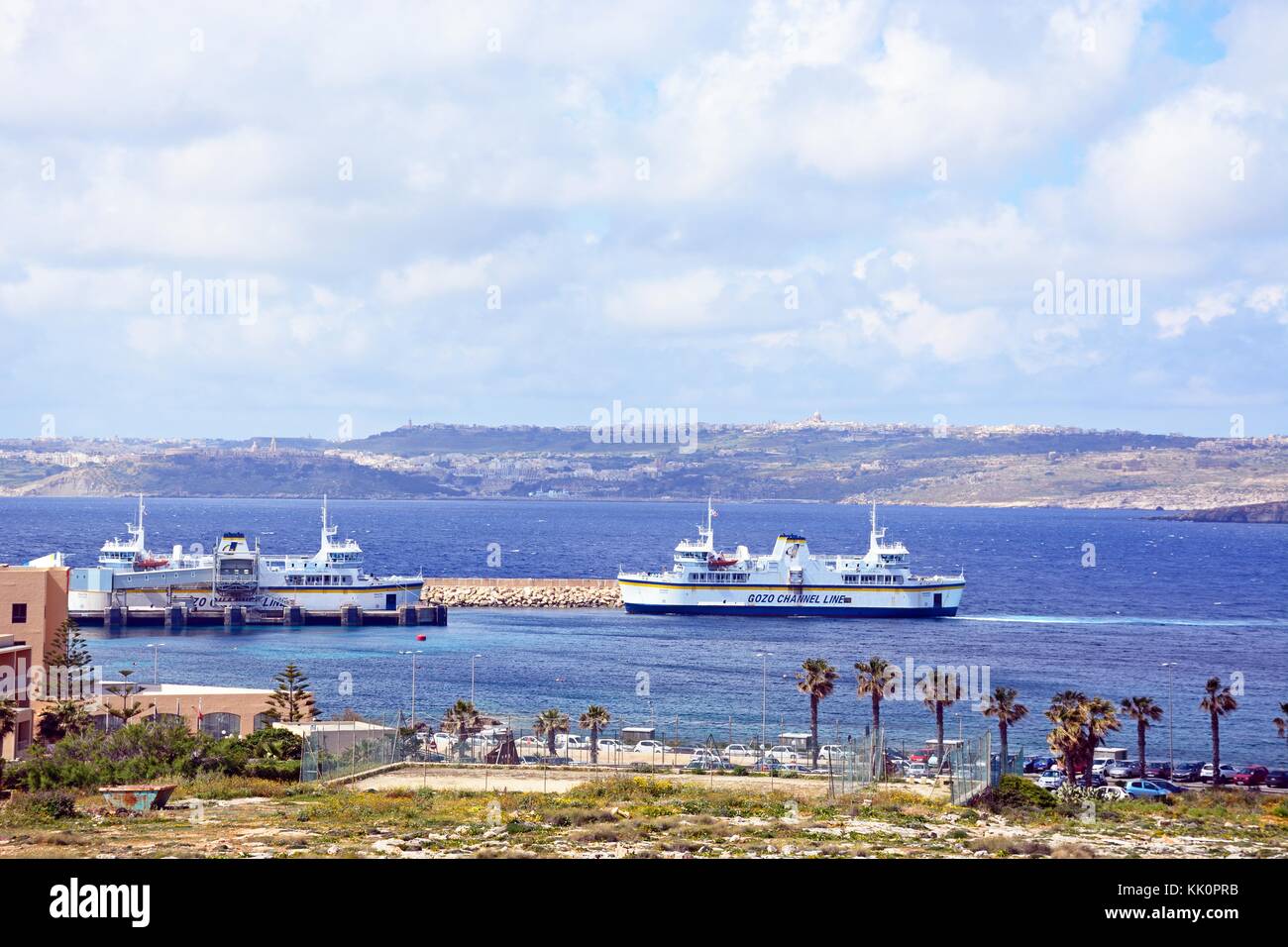 Gozo ferry in the ferry terminal with views towards Gozo, Paradise Bay, Malta, Europe. Stock Photo