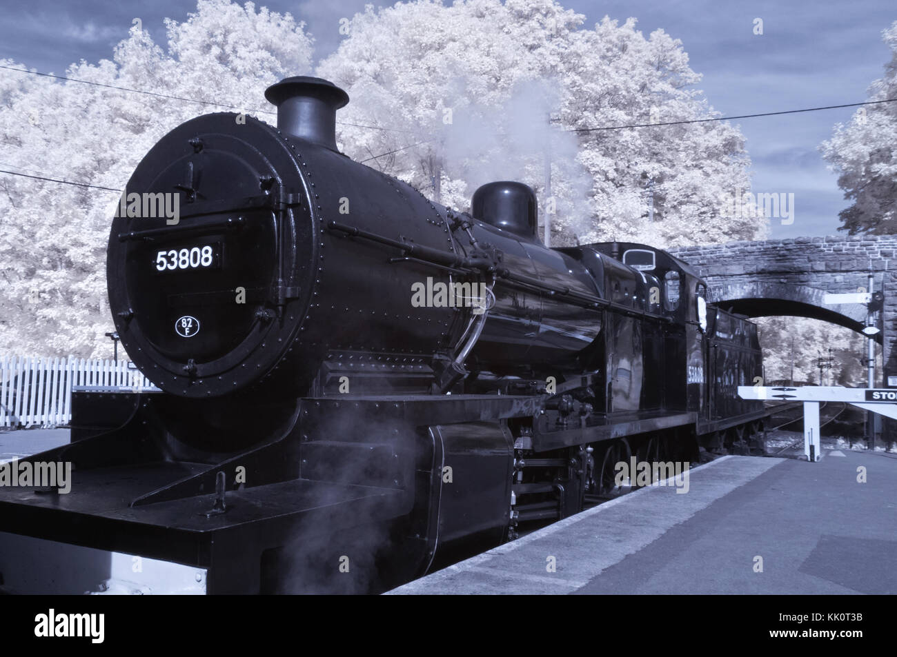 Hall class steam engine 53808 being coupled to the front of a passenger