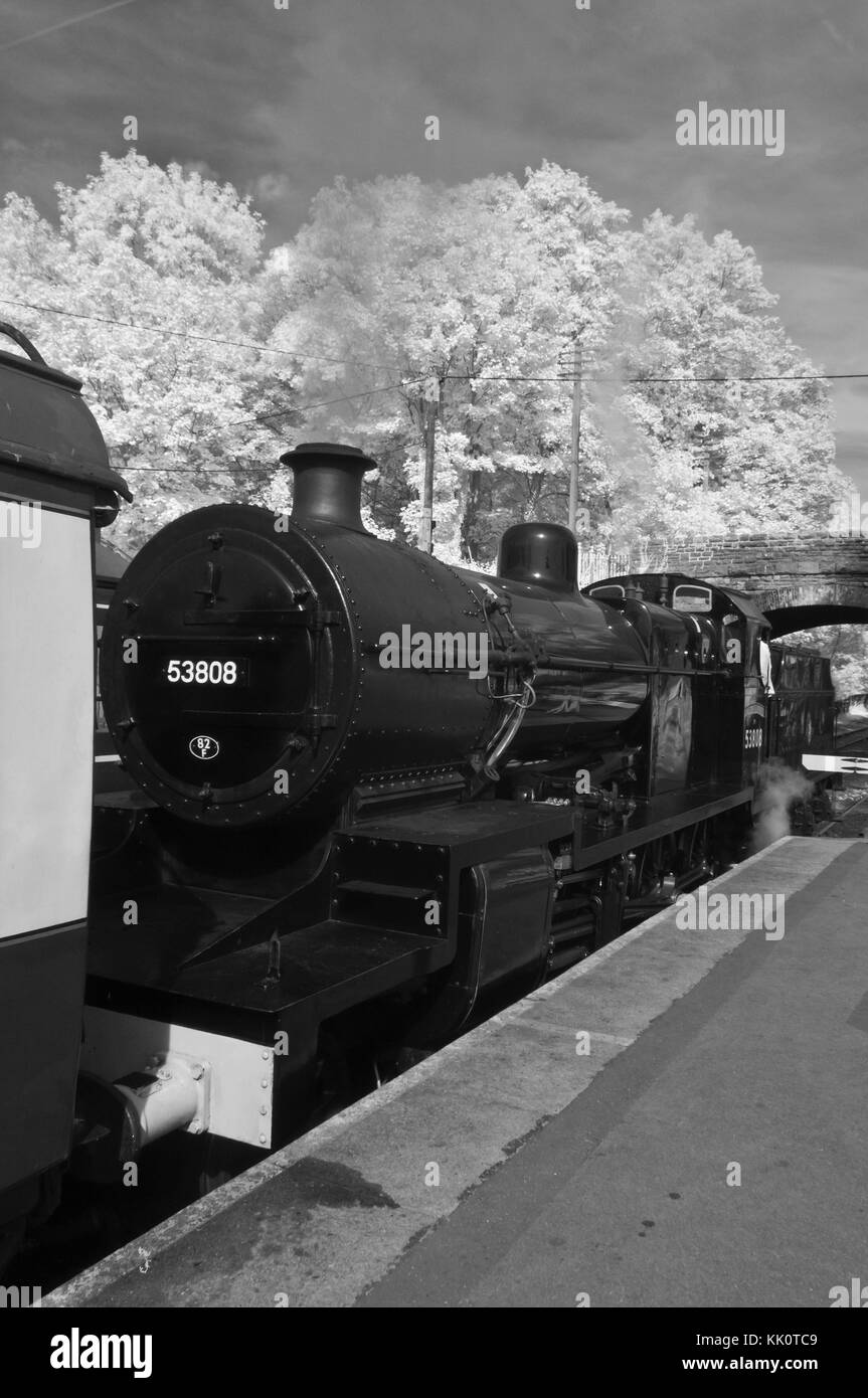 Hall class steam engine 53808 being coupled to the front of a passenger
