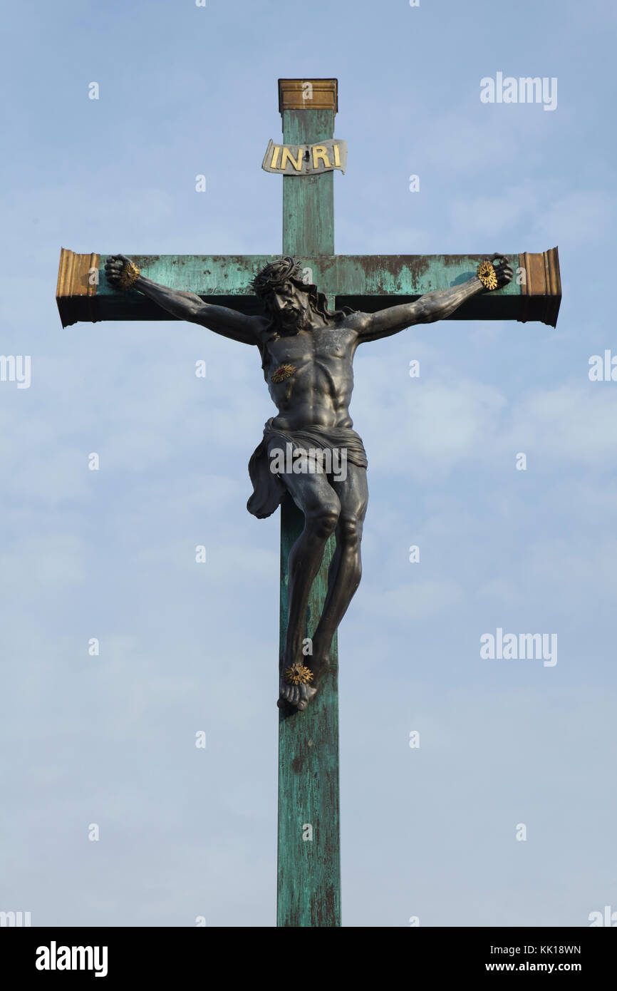 Crucifix on the Stone Bridge (Kamenný most) in Písek in South Bohemia, Czech Republic. Stock Photo