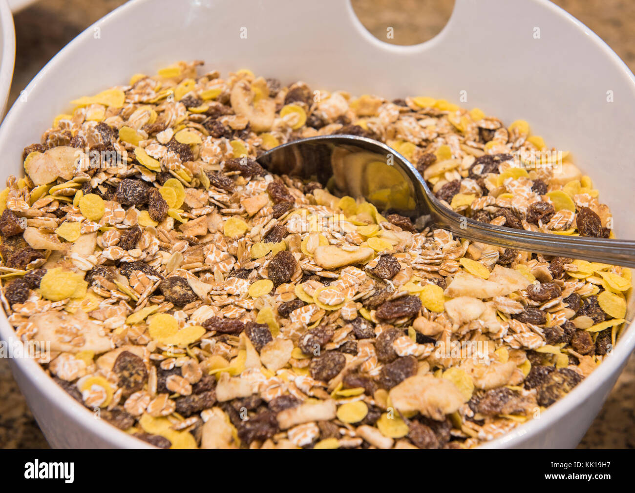Selection display bowl of museli breakfast cereal food at a luxury restaurant buffet bar area Stock Photo
