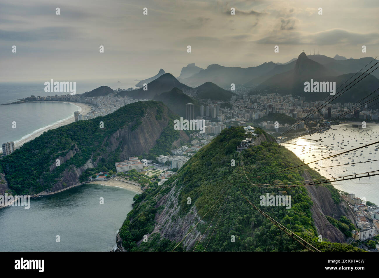 Premium Photo  Yacht club in urca bay of rio de janeiro and christ the  redeemer between the clouds leaning out