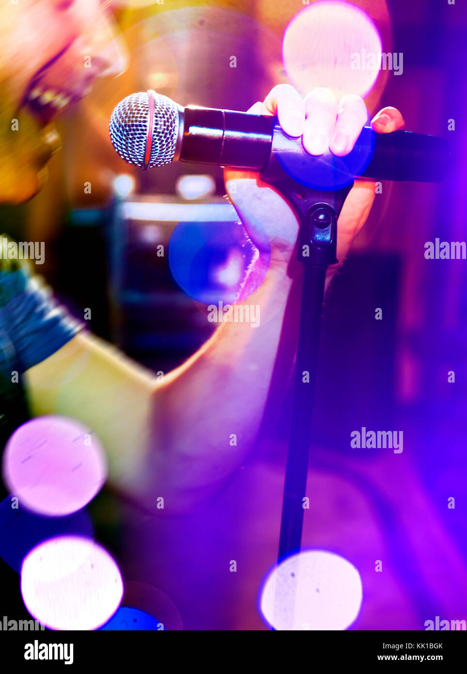 Live music background. Karaoke and microphone concept. Stage lights and  singer Stock Photo - Alamy