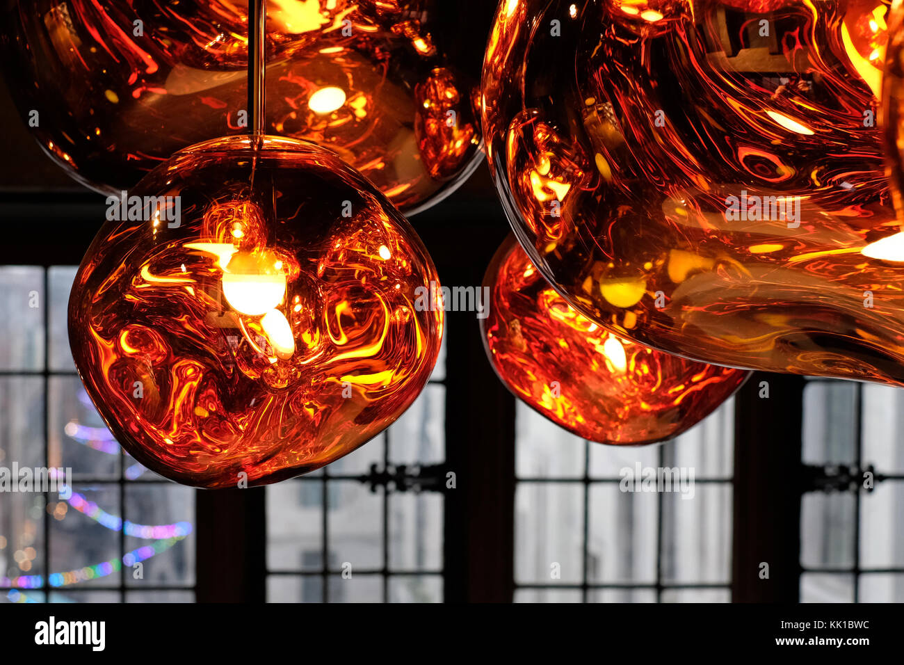 At læse sydvest Formode Tom Dixon copper colour 'Melt' pendant lights hanging in the Liberty of  London store, London UK. Photographed November 2017 Stock Photo - Alamy