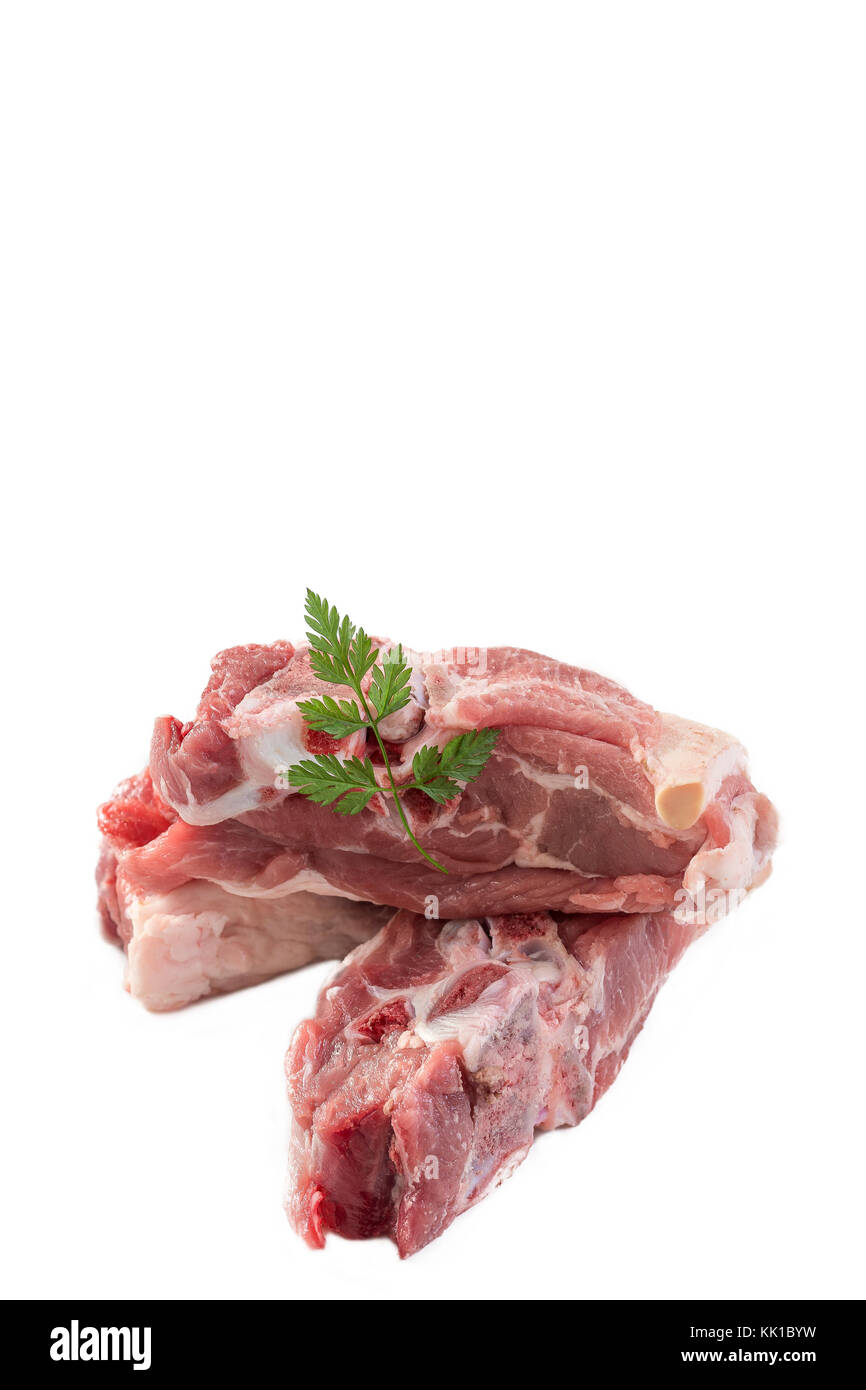 uncooked raw lamb ribs served on WHITE BACKGROUND HORIZPNTAL PICTURE Stock Photo