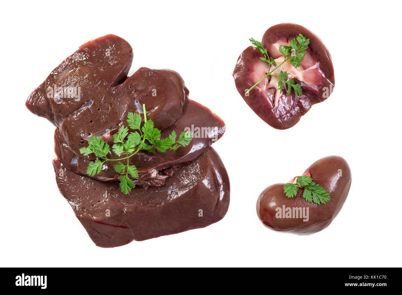 collection of raw lamb offal kidney, liver, heart a white background Stock Photo