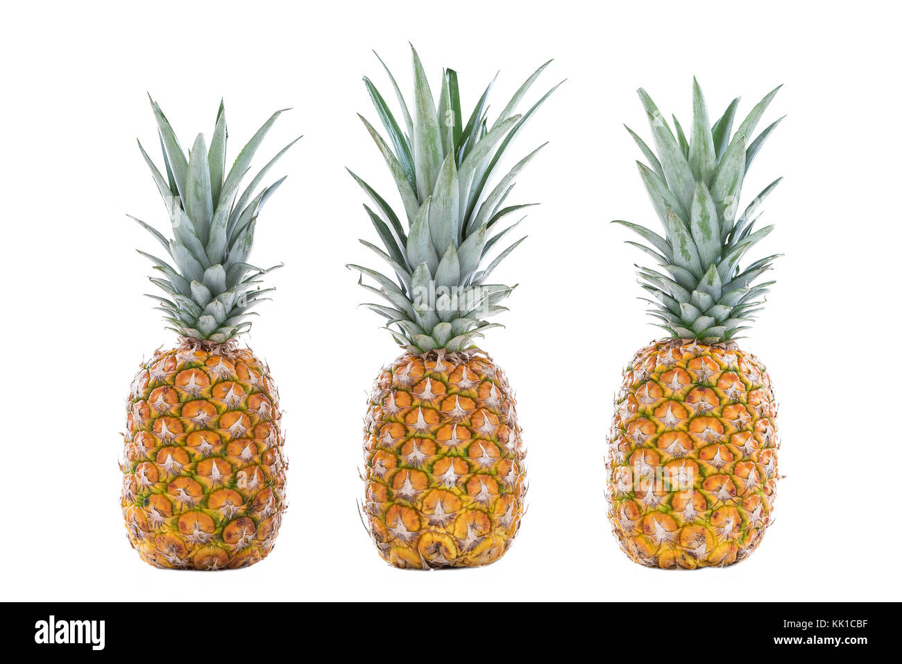 closeup three pineapple on a white background Stock Photo