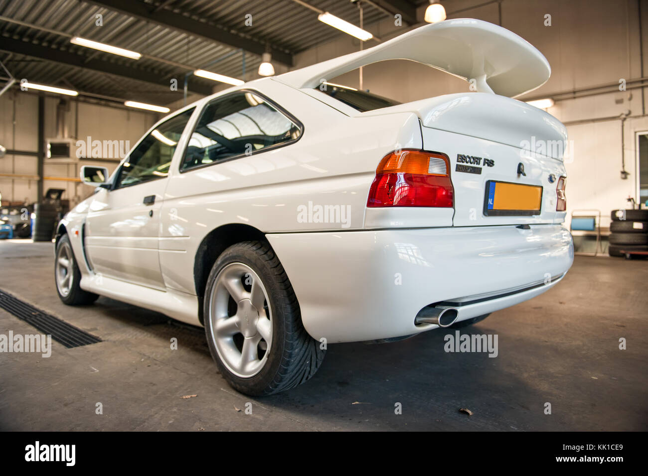 close up photo of a white all-original 1994 big turbo Ford Escort RS Cosworth Stock Photo