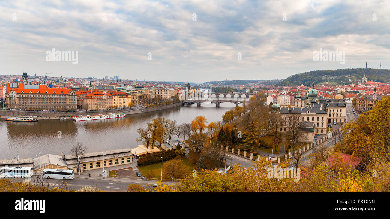 Wide panoramic view of Prague over Vltava river. Heart of old town ...