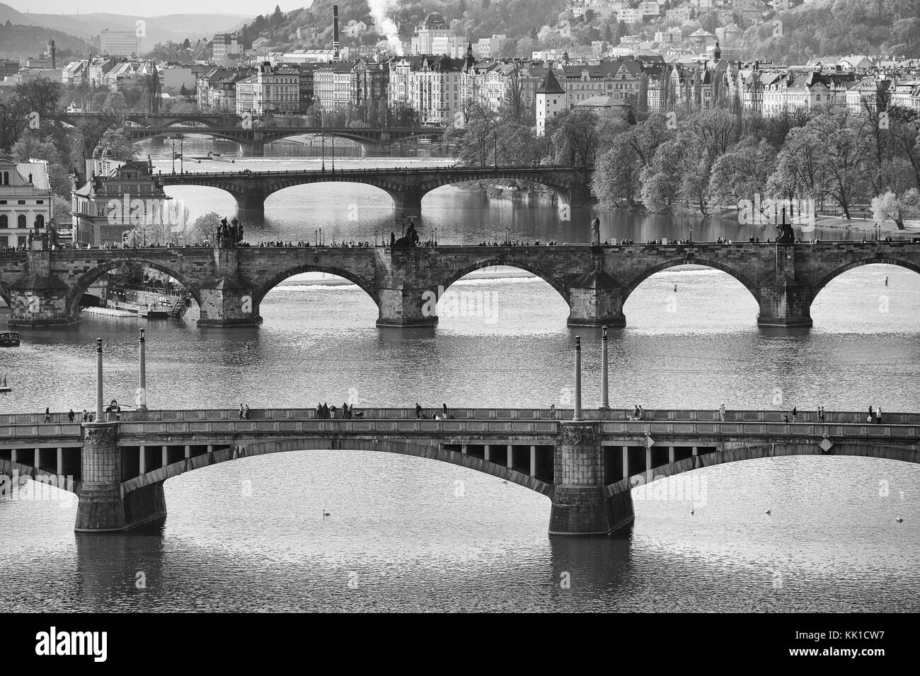 Remarkable view of Prague bridges over Vltava river. Daytime, spring season. Black and white photo. Stock Photo