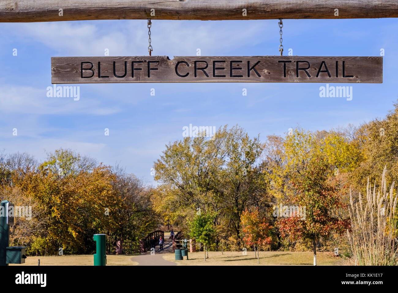 The entrance and wooden sign to Bluff Creek trails in Bluff Creek park and walking biking paths. Oklahoma City, Oklahoma, USA. Stock Photo
