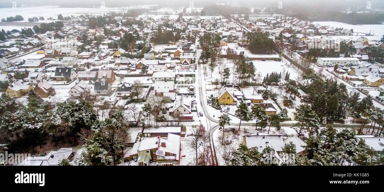 First snow in a small village in Lower Saxony, Germany, aerial view with drone Stock Photo