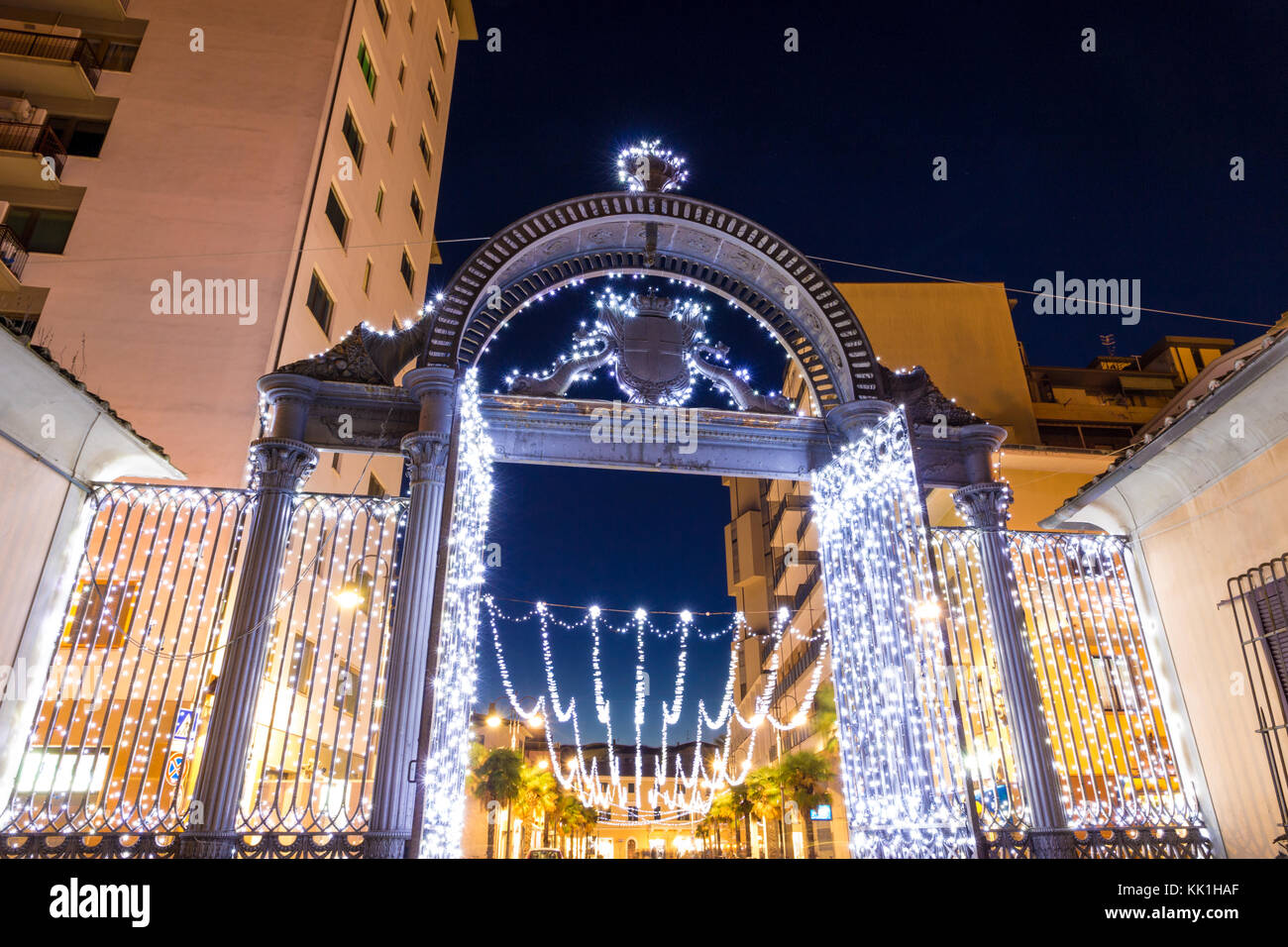 Old 1840s Gate of the former ILVA Ironworks Complex in Follonica at Christmas time Stock Photo