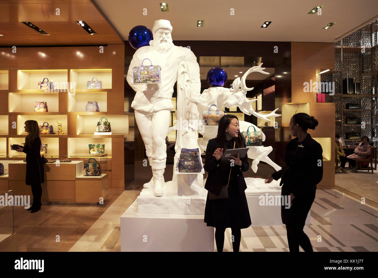 Louis Vuitton London, UK. Louis Vuitton shop interior showing Father  Christmas with reindeer; exclusive bags The masters collection by Jeff  Koons Stock Photo - Alamy