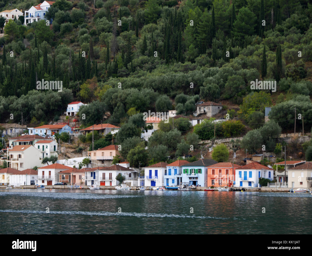 Colourful houses on the waterfront at Vathy, Ithaca, Greece Stock Photo