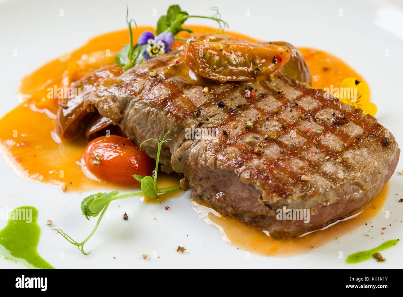 gourmet grilled beef steak entrecote in white plate Stock Photo - Alamy