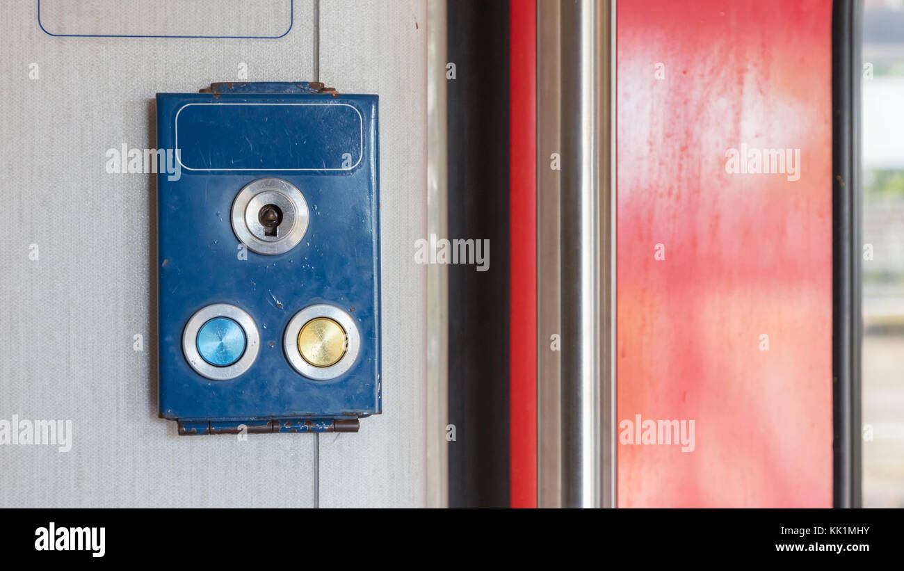 Old push button in a dutch train Stock Photo Alamy