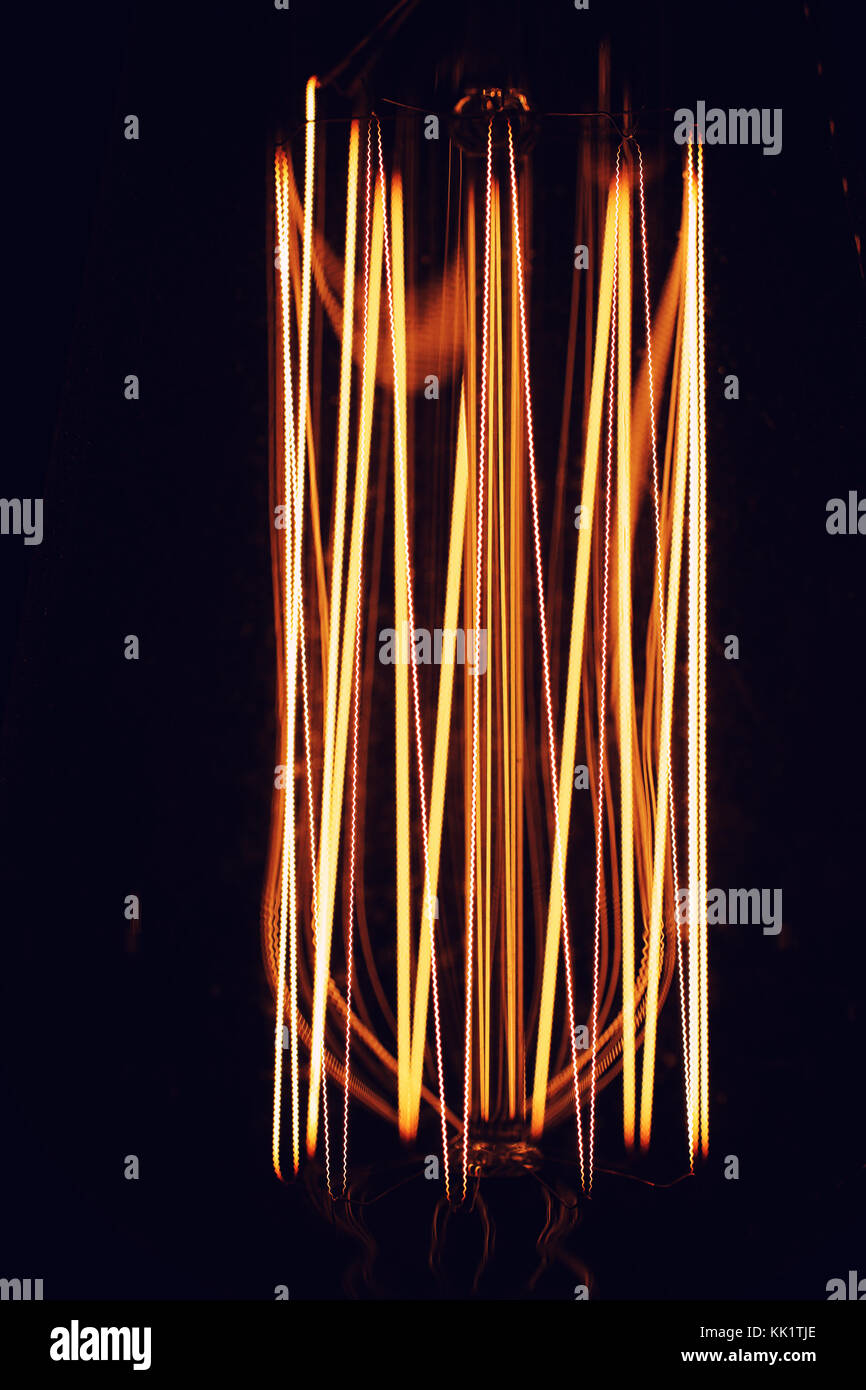 Lamps with tungsten filament. Edison light bulb. Filament filament in