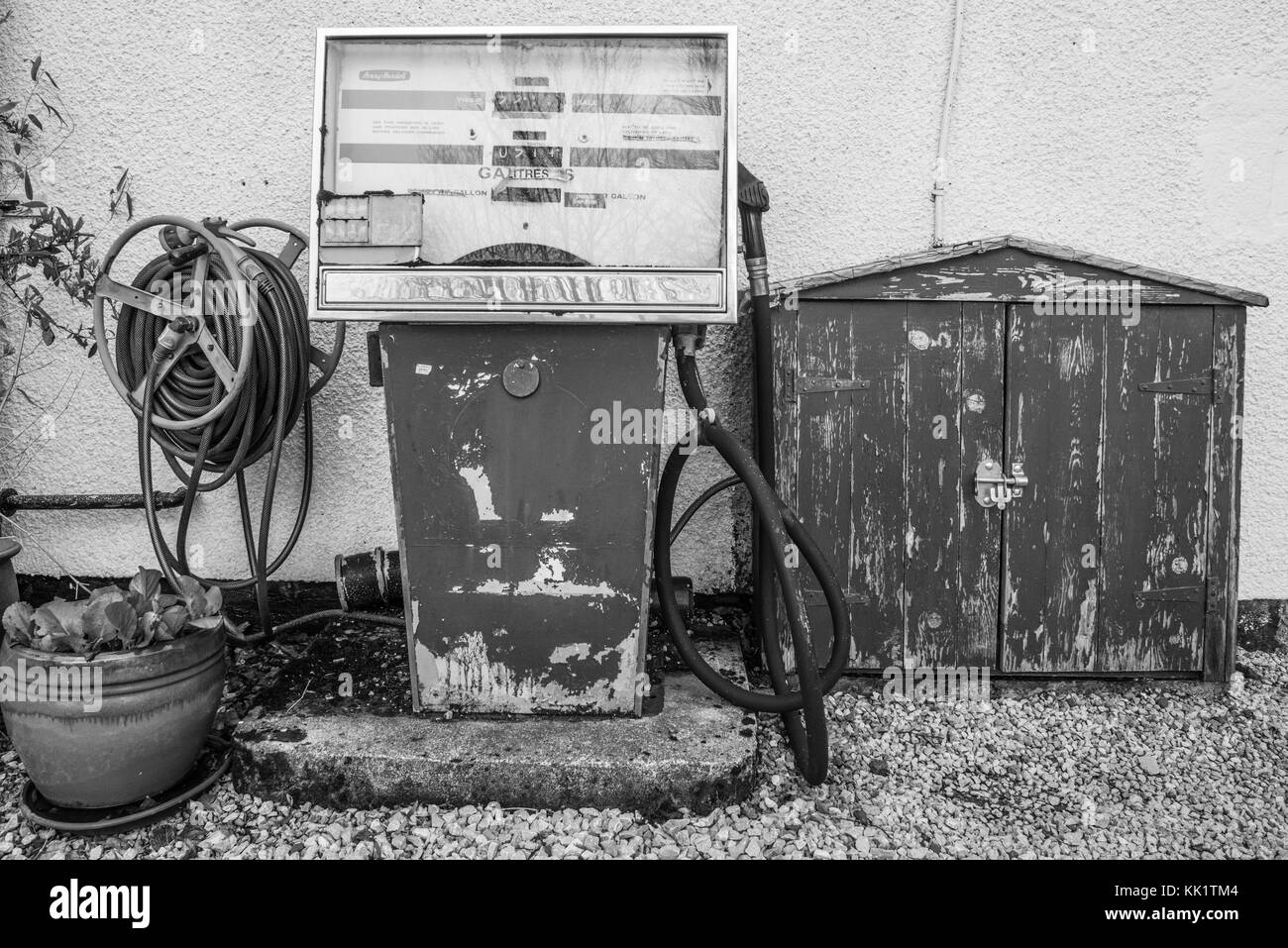 Disused petrol pump at the High Peak Bookstore by the A515 at Brierlow Bar in Derbyshire. Stock Photo