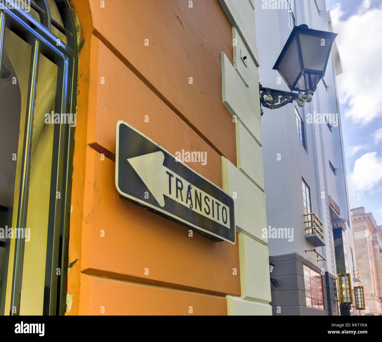 Transit sign in Spanish along the classical colonial style architecture of Old San Juan, Puerto