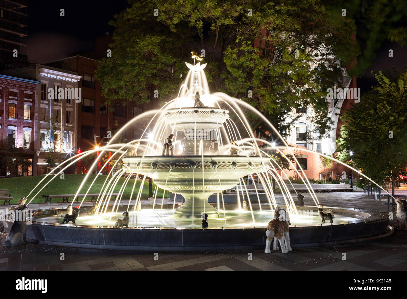 Toronto, Canada - Oct 16, 2017: Dog fountain at the Berczy Park in the city of Toronto. The fountain was designed by the architect Claude Cormier. Pro Stock Photo