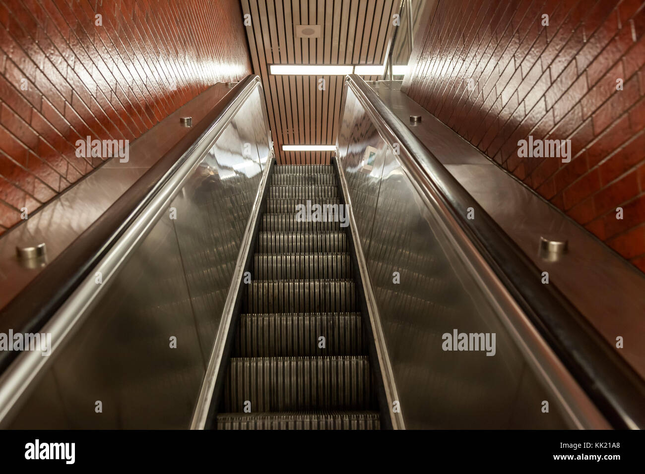 Escalator moving up stairs in a metro station Stock Photo Alamy