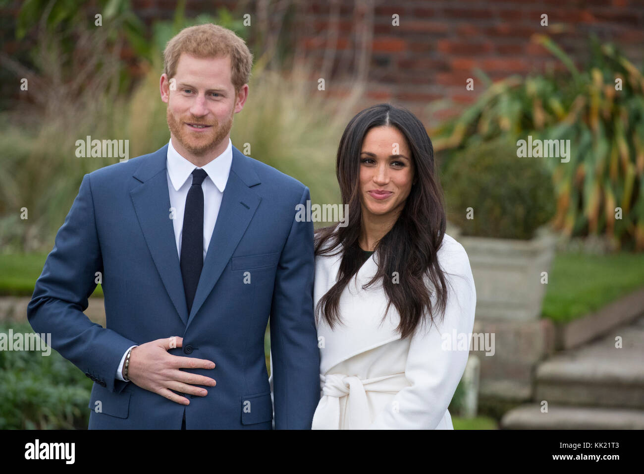 27th November 2017 London UK Britain's Prince Harry and his girlfriend Meghan Markle pose for photographs in the Sunken Garden at Kensington Palace in London after they announced their engagement. Stock Photo