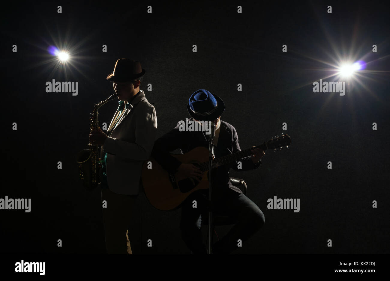 Musician Duo band playing a saxophone and singing a song and playing