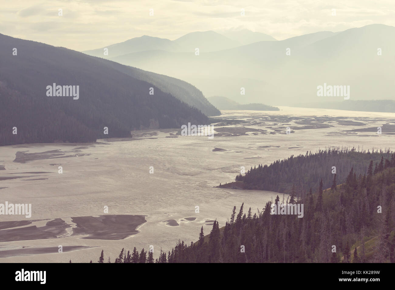 Picturesque Mountains of Alaska in summer. Snow covered massifs, glaciers and rocky peaks Stock