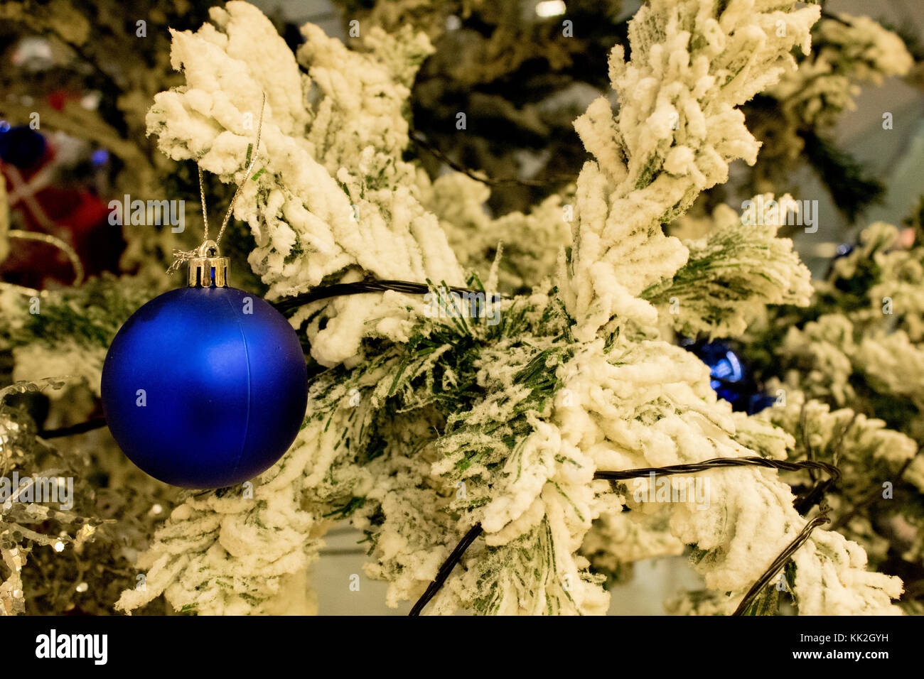 A Christmas tree with glossy blue bubbles . this tree decorated in city center of Isfahan Iran for Christians . Merry Christmas to every Christians. Stock Photo