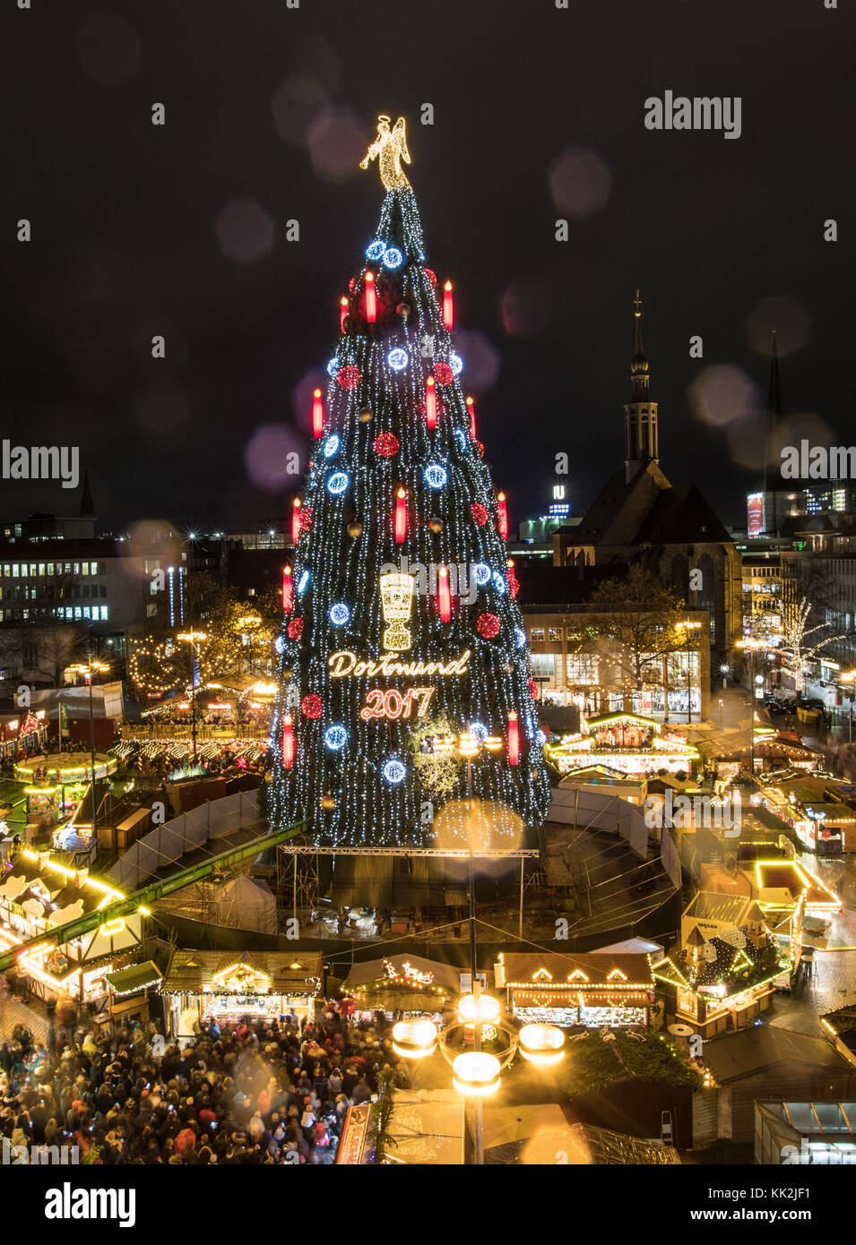 The world's largest Christmas tree, according to the organizers, shines