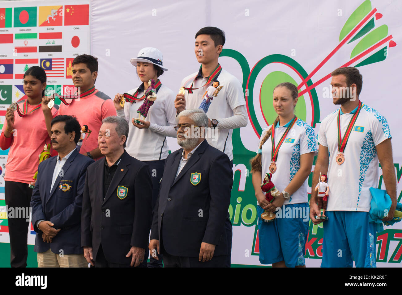 Dhaka, Bangladesh. 28th November 2017. South Korea won the first archery gold medal of the 20th Asian Archery Championship beating India by 157-153 points in the compound mixed team event final held on Tuesday at Bangabandhu National Stadium, Dhaka, Bangladesh. A total of 33 countries are competing for the 10 gold medals in the championships. The 20th Asian Archery Championship 2017, begins Dhaka, Bangladesh on Saturday (November 25) for the first time in Bangladesh under the auspices of Bangladesh Archery Federation (BAF) and World Archery Asia (WAA). Azim Khan Ronnie/Alamy Live News Stock Photo