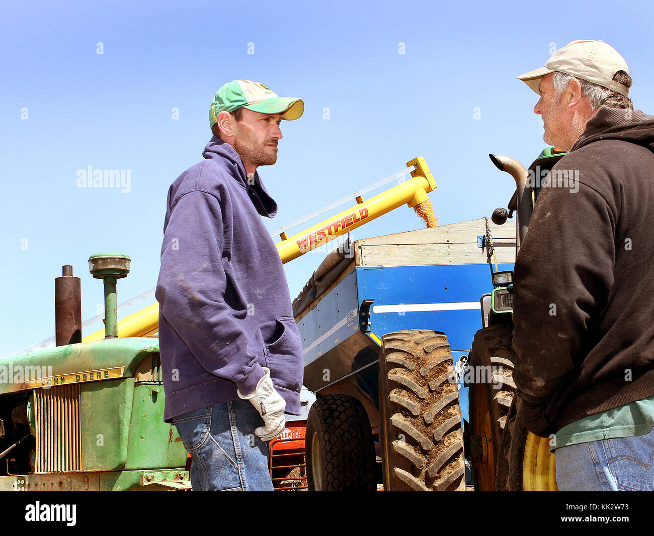 Eldridge, Iowa, USA. 25th Apr, 2013. Kenny Edwards, left, who works for