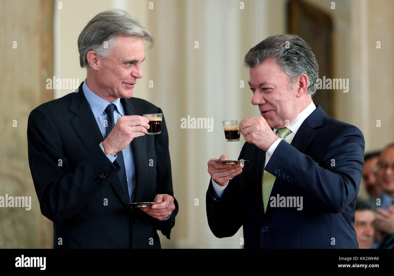 Bogota, Colombia. 28th November, 2017. Colombian President Juan Manuel  Santos (R) drinks coffee with Nespresso's CEO Jean-Marc Duvoisin at the  Narino Palace in Bogota, Colombia, 28 November 2017. The Swiss  multinational Nestle