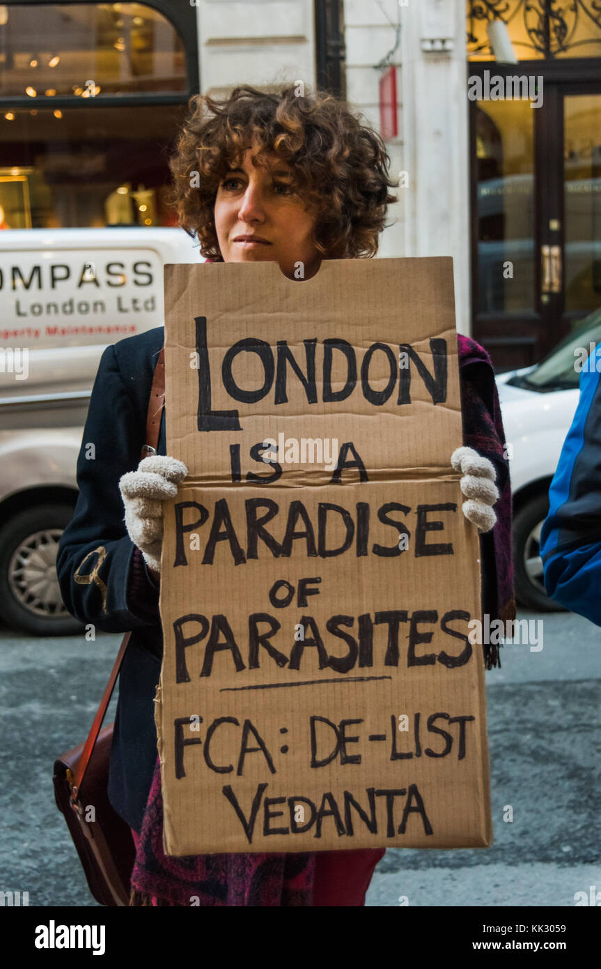 November 28, 2017 - London, UK. 28th November 2017. A campaigner speaks about the activites of Rio TInto on the pavement outside their offices on the 'Toxic Tour' of a few of London's major players among the mining companies violating human rights, killing opposition, displacing indigenous people, polluting water sources and causing climate chaos around the world was one of a week of activities organised as an alternative to the London Mines and Money Conference involving around 2,000 mining company representatives, investors and financiers, organised by London Mining Network, War on Want and Stock Photo
